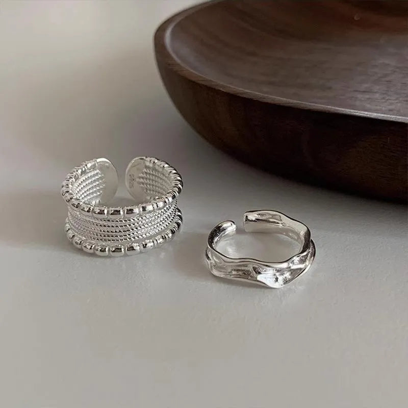 Women's geometric ring with woven twisted multilayer design and adjustable opening