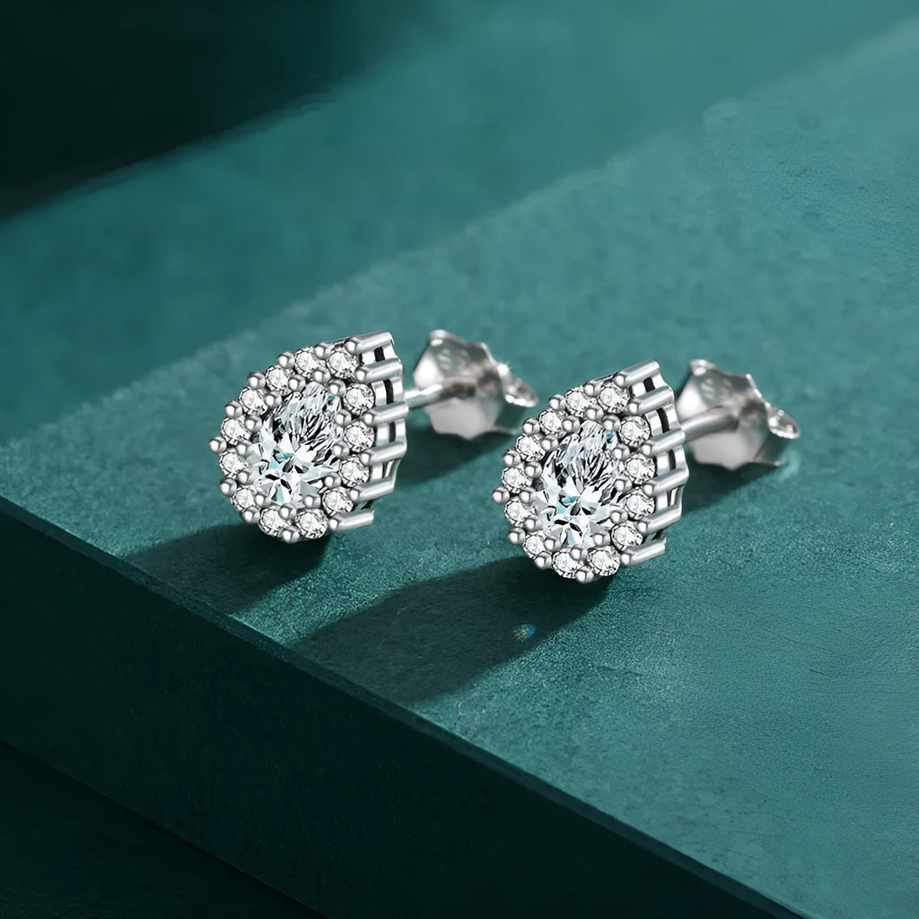 Women's silver water drop ear studs with diamond finish and 925 sterling silver construction
