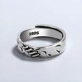 Black geometric copper ring with adjustable opening mechanism for women's fashion jewellery