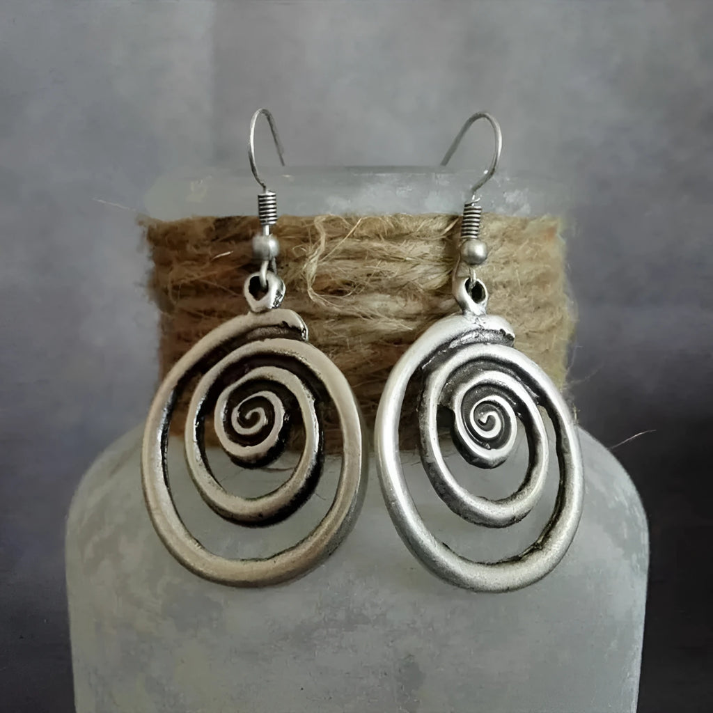 Silver alloy geometric spiral distressed drop earrings with national style, shown front-on.