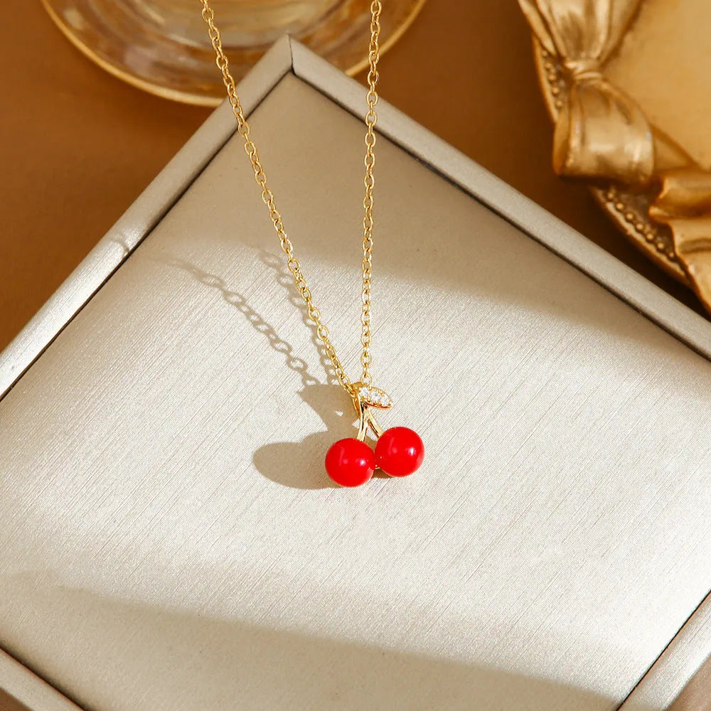 Titanium steel women's necklace with fruit pendant on O-ring chain in golden and steel colour options