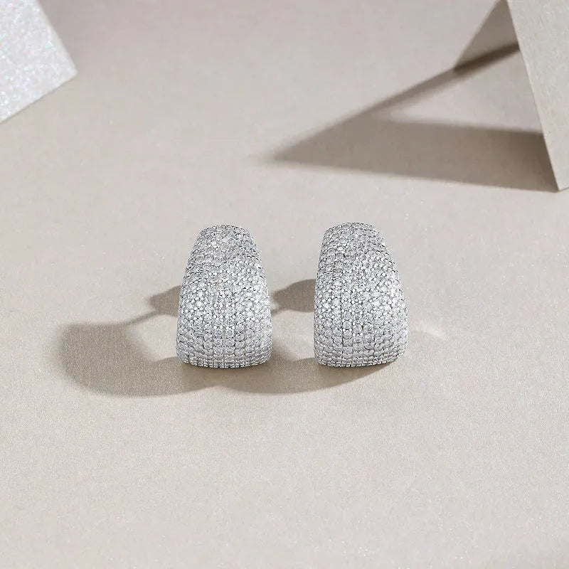 Geometric S925 sterling silver stud earrings with a white moissanite centre for women.