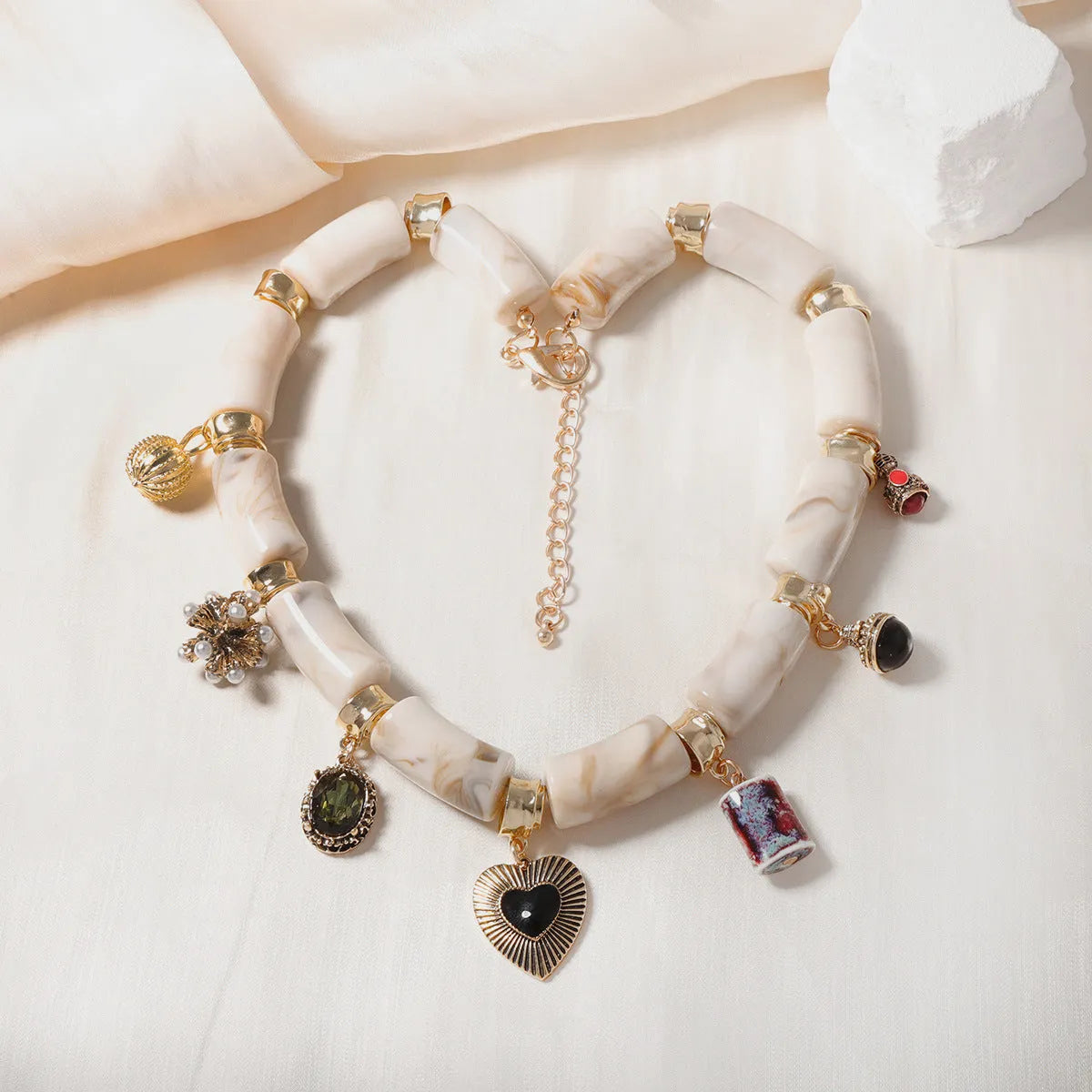 Heart shaped resin bamboo pendant necklace with electroplated finish in picture color for women