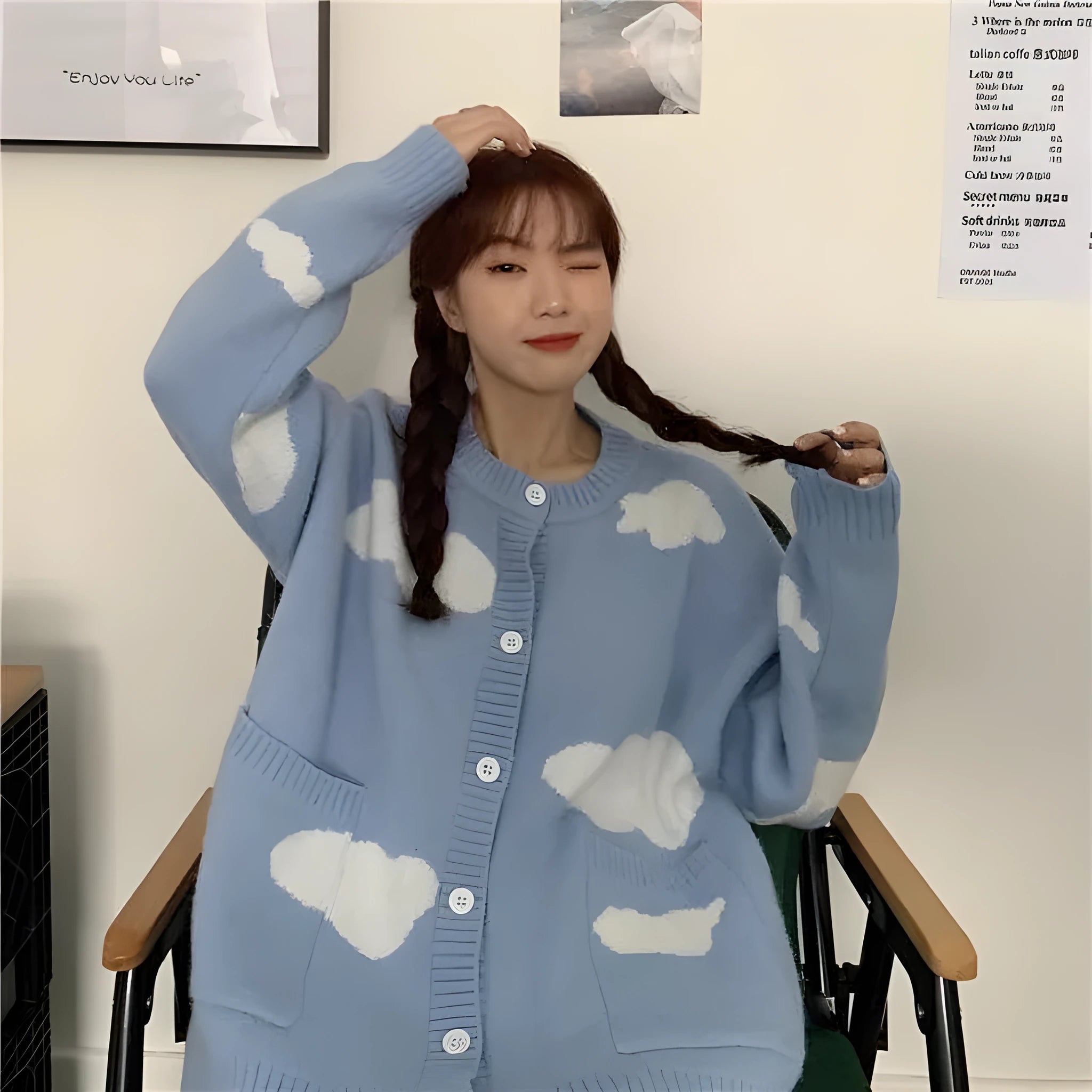 Women's blue cloud pattern cardigan sweater with loose fit and long sleeves