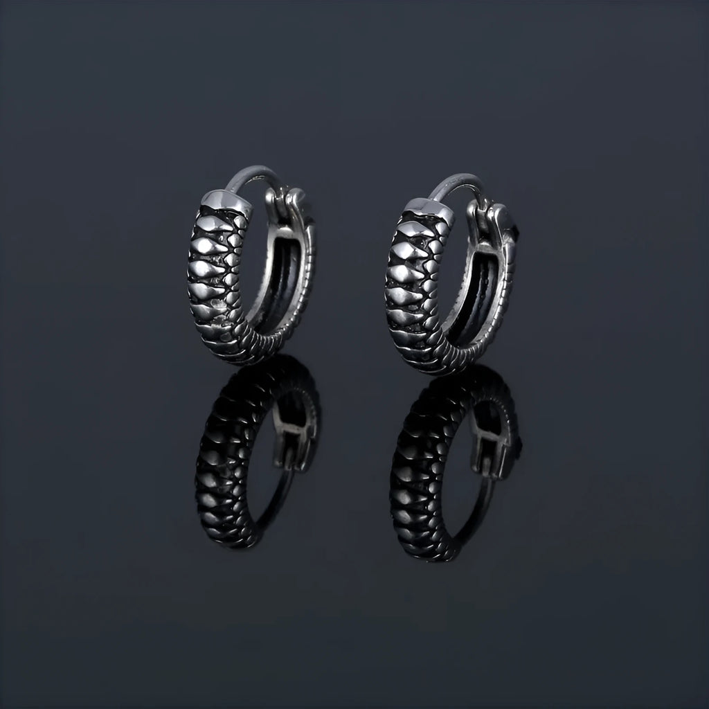 Silver geometric retro twist earrings made from titanium steel alloy with stripe detailing.
