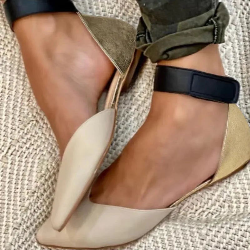 Women's hollowed velcro sandals in PU material showing adjustable straps and flat heel design