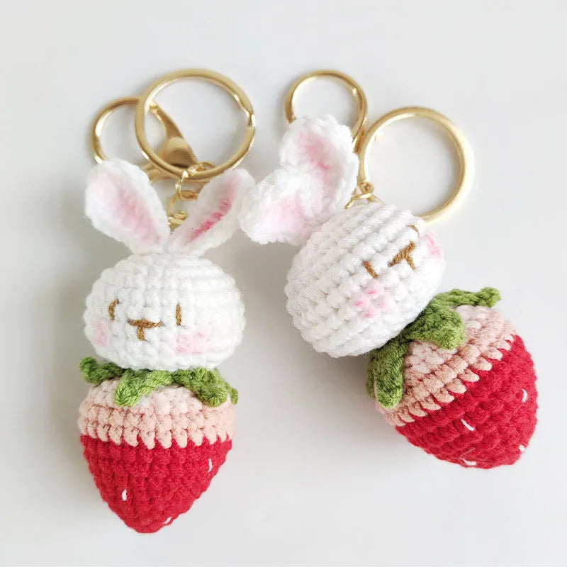 White hand-woven wire pendant with rabbit strawberry pattern and keychain attachment