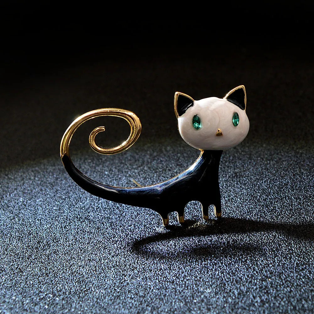 Women's alloy cat brooch with painted tail-up kitty design in orange or white colour