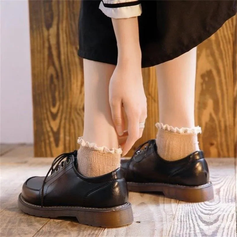 Women's preppy style Mary Jane pumps with round toe and front lace-up in black and brown