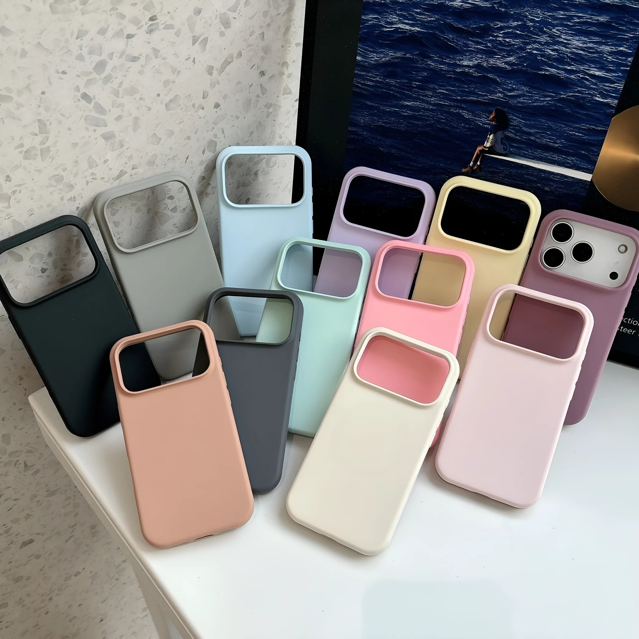 Liquid silicone magnetic charging phone case with Ai button for iPhone, shown in antique white colour.