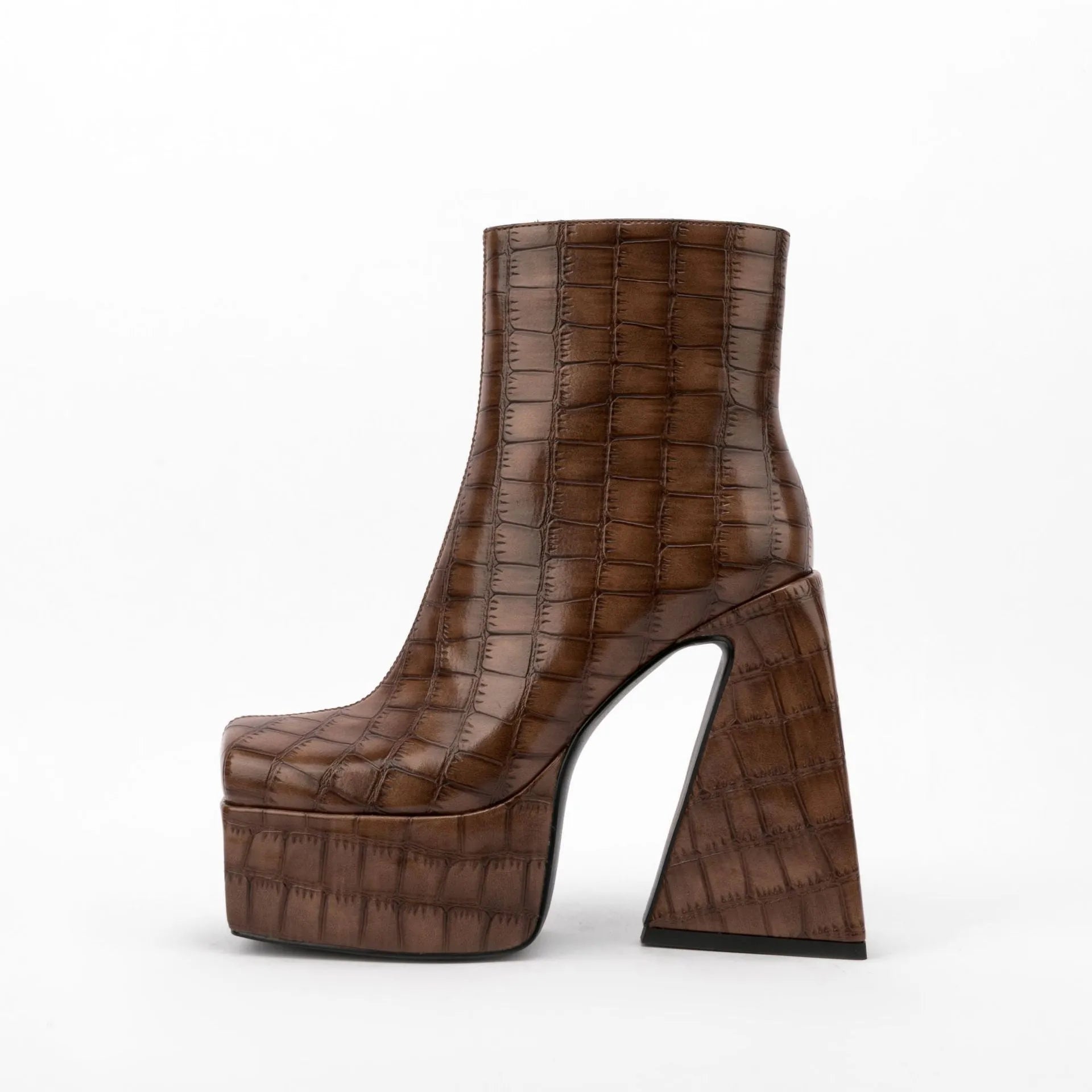 Women's ankle boots with a super high heel in artificial PU, shown in beige colour.