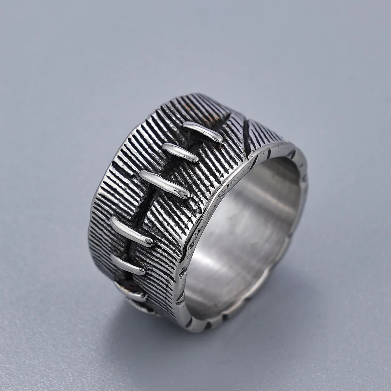 Dark punk stitched titanium steel ring with double U-shaped geometric design in retro colour