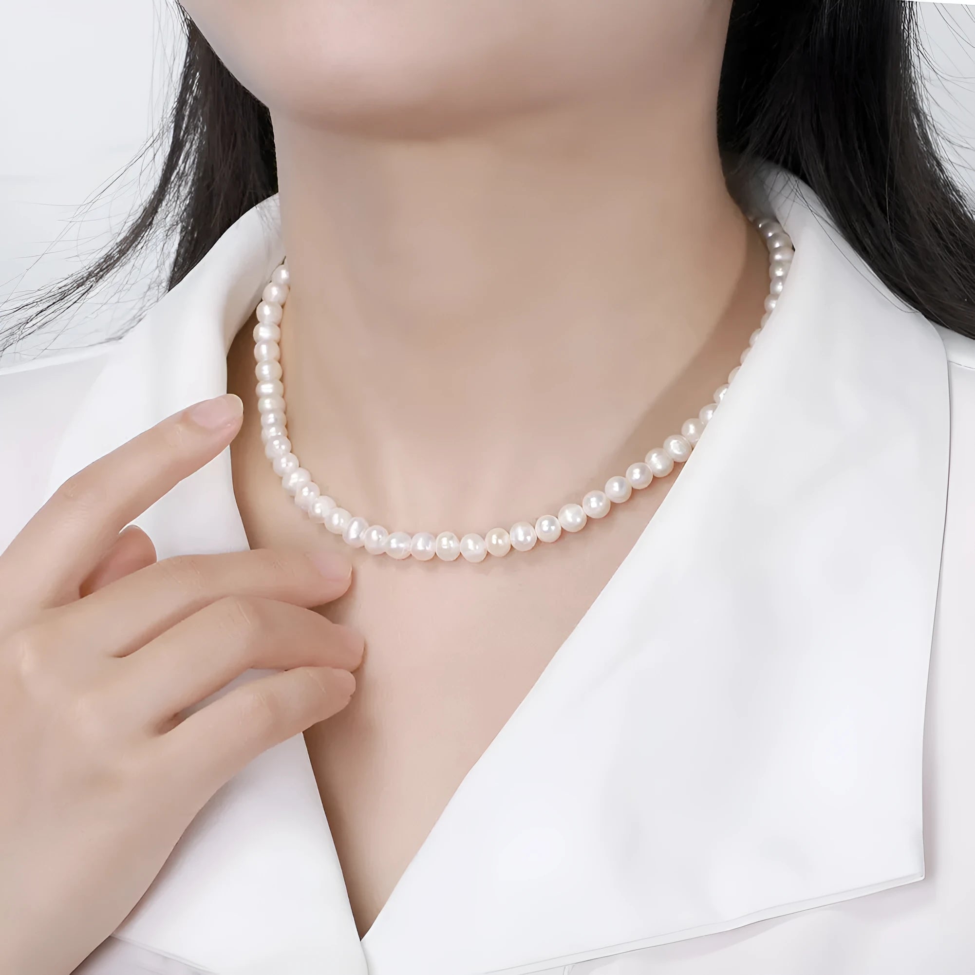 Women's freshwater pearl necklace with adjustable sterling silver chain and 6-7mm natural pearls