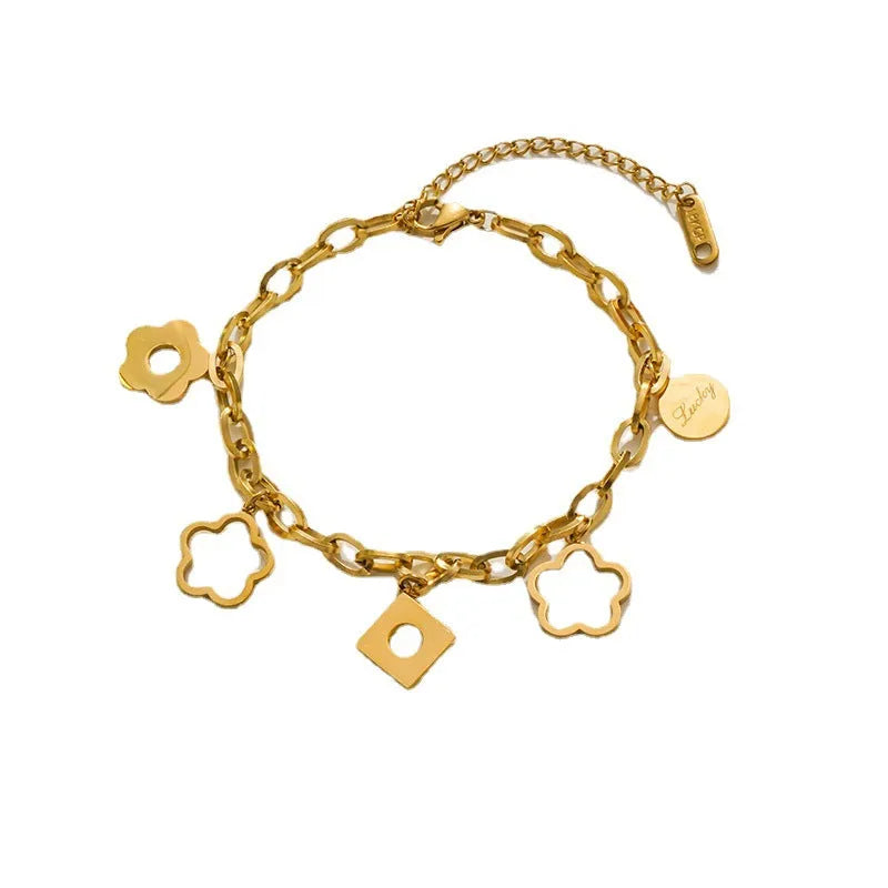 Titanium steel flower small pendant bracelet for women in gold electroplated finish