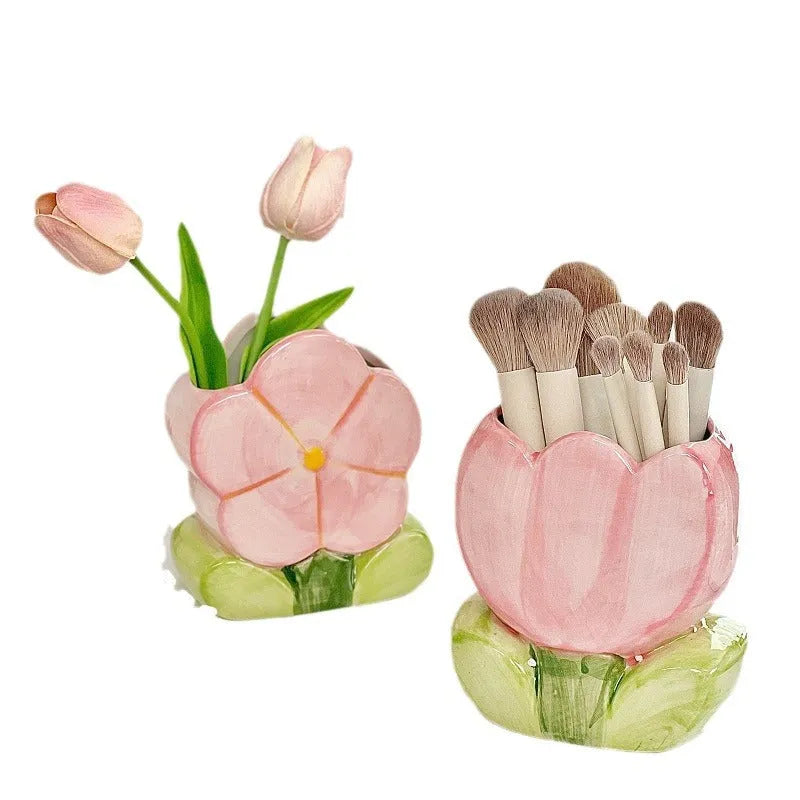 Ceramic floral pen holder storage box with pink tulip design on desktop