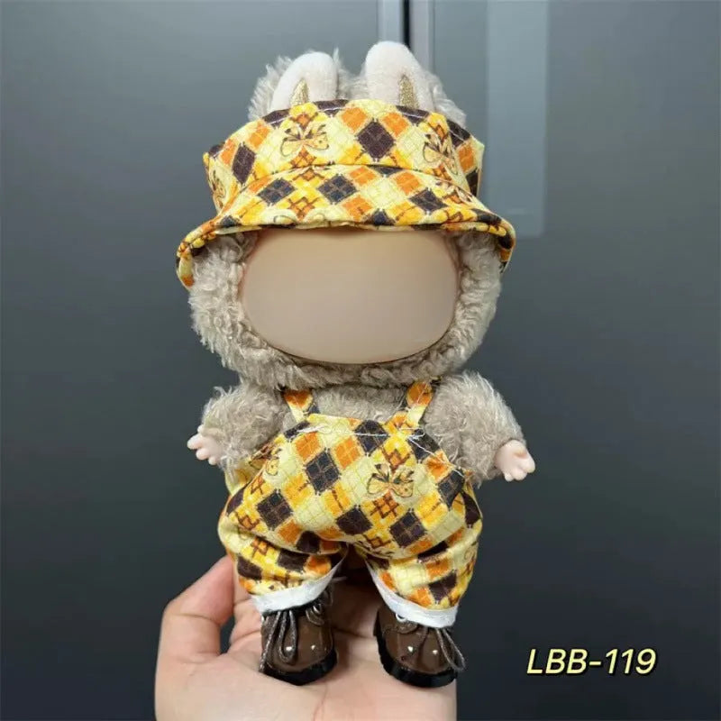 Plastic clothing outfit for a 17cm tall collectible vinyl figurine doll.