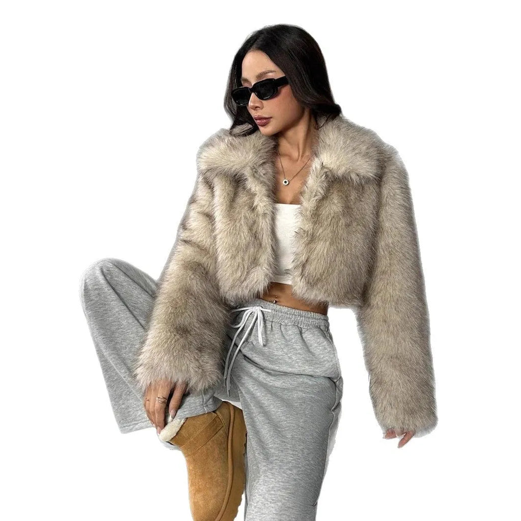 Artificial fur coat with fox fur style design in black tip colour variation