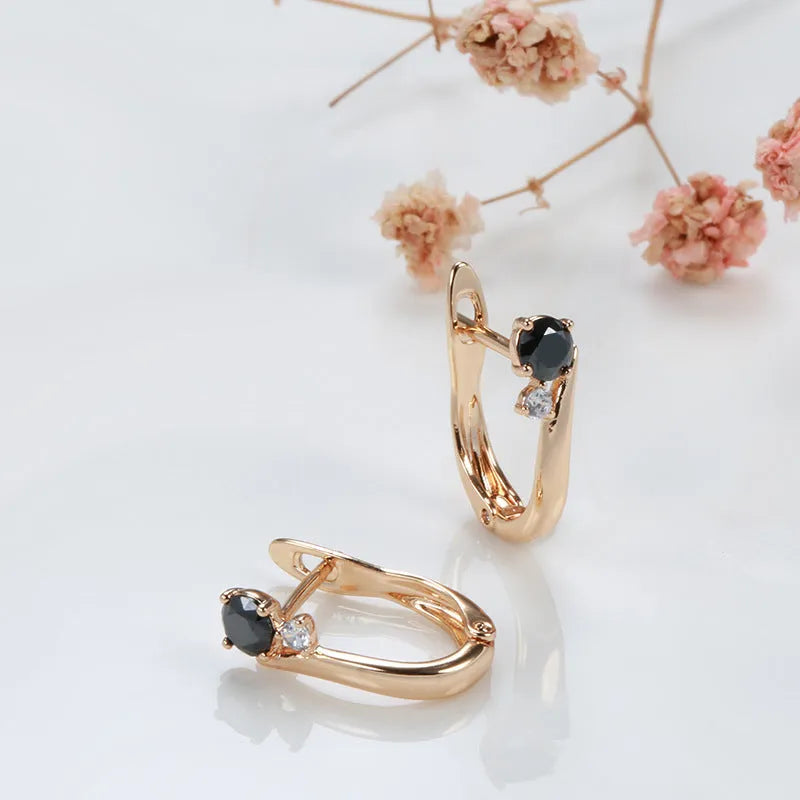 Women's gold-colour drop earrings with black agate geometric design and retro styling on ear clips