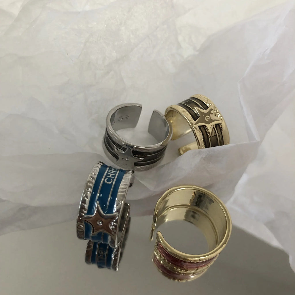 Adjustable retro-style geometric copper ring with line detailing and electroplated finish.