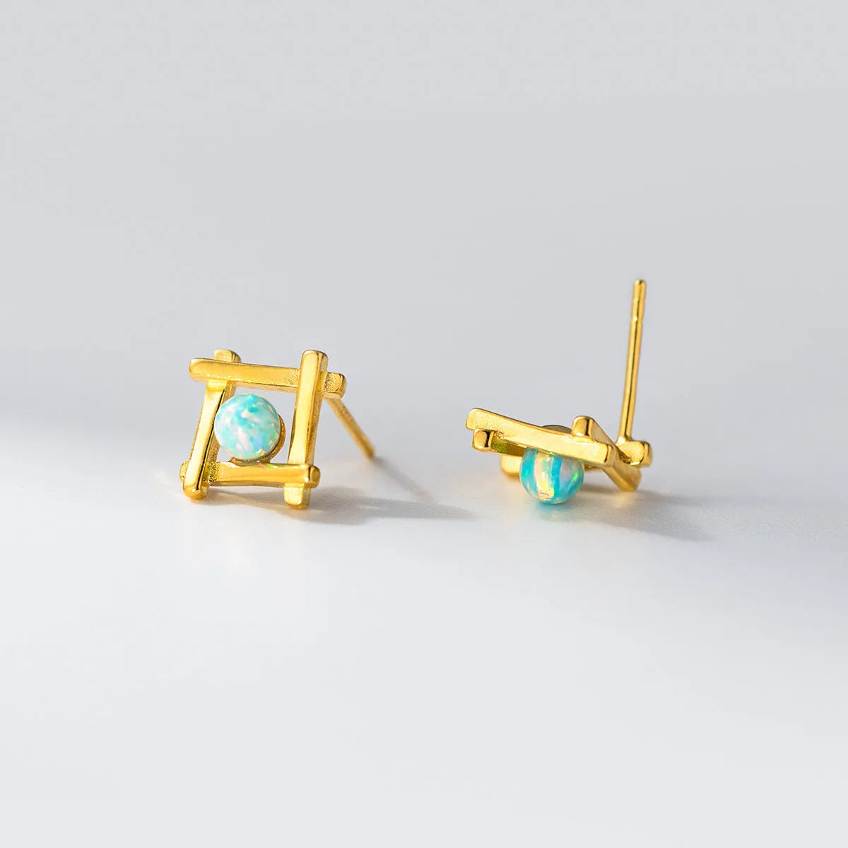 Women's geometric cross quadrangle stud earrings in S925 silver available in silver and gold tones