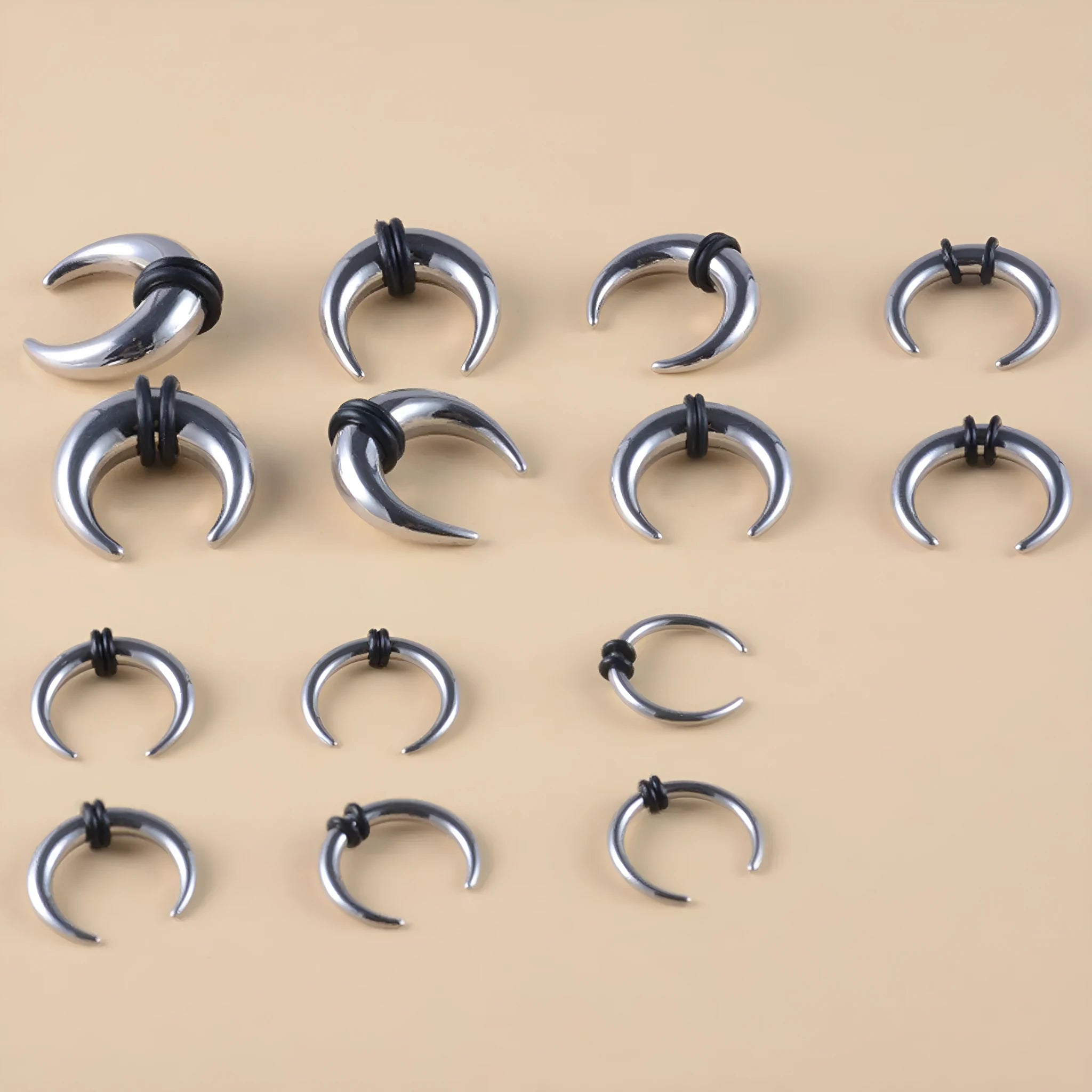 316 stainless steel C-shaped nose ring with buffalo horn detail in steel and black colour options.