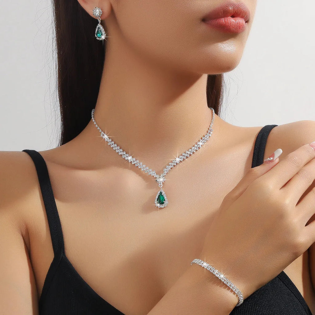 Women's claw chain necklace and earrings set with drop-shaped rhinestone pendants