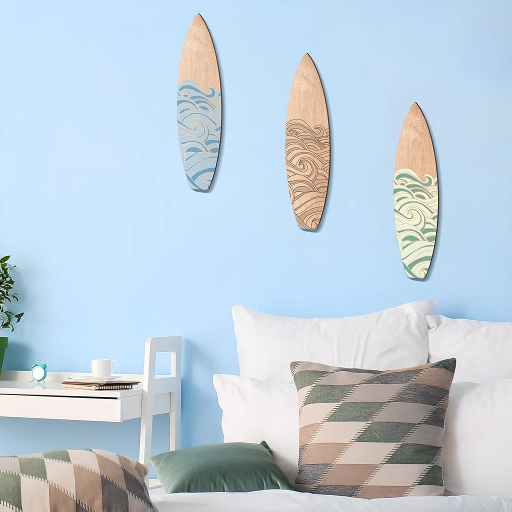 Three wooden surfboard wall decorations with European styling on a white background