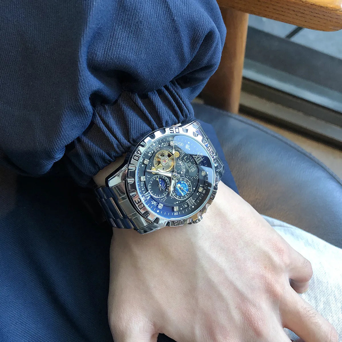 Men's silver case automatic mechanical watch with black starry dial on genuine leather strap
