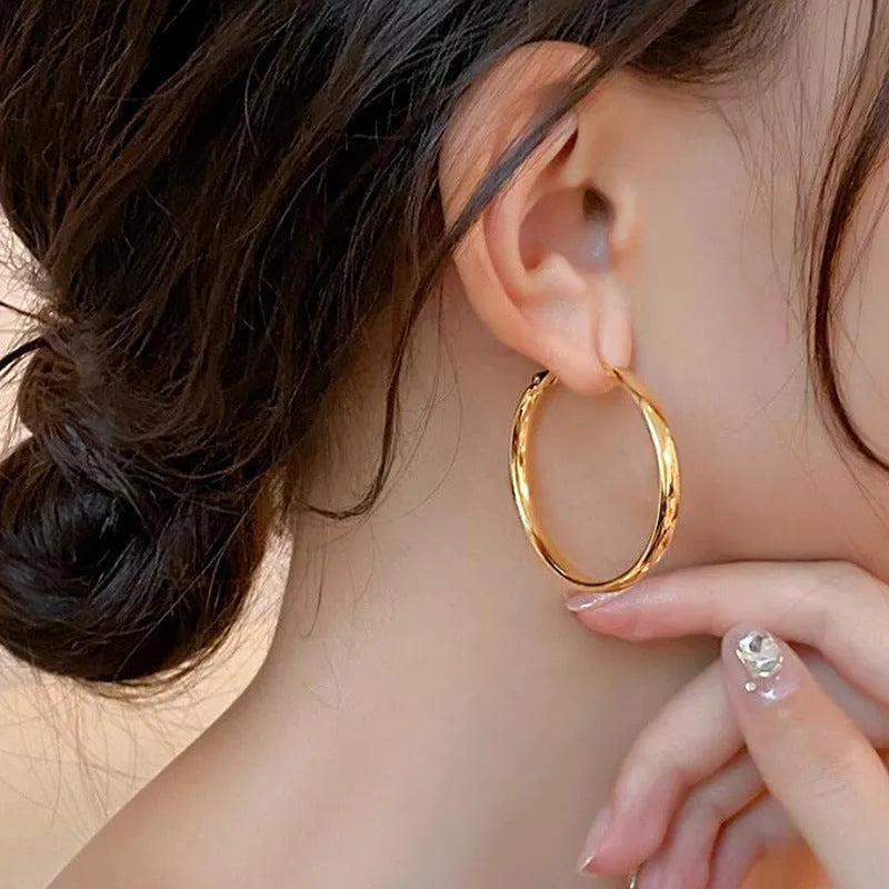 40mm circular copper earrings with electroplated gold or silver finish