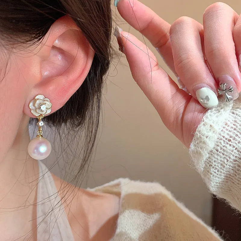 Camellia flower-shaped stud earrings in alloy with floral detailing