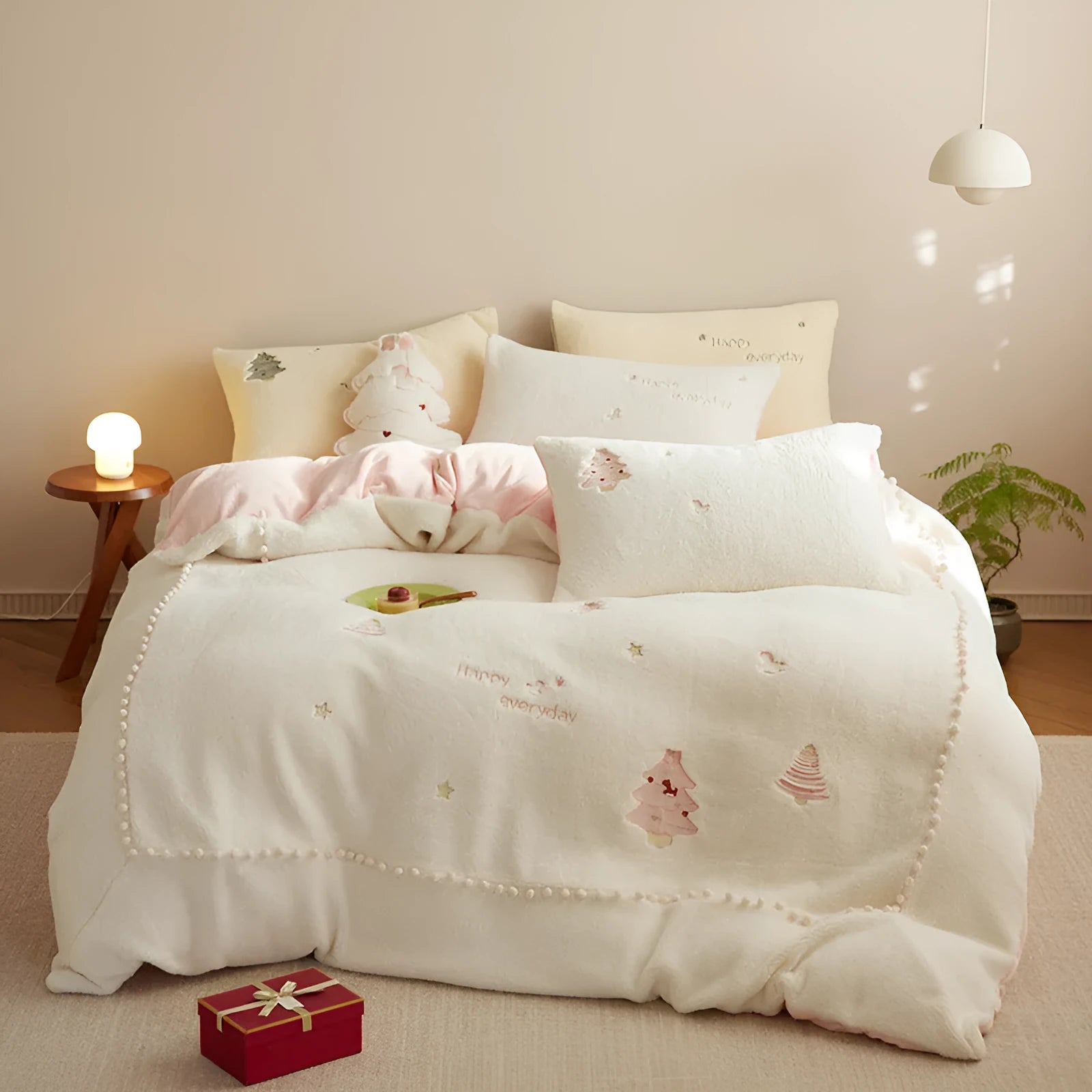 Milk fibre bedding four-piece set with green Christmas tree pattern showing quilt cover, sheet, and pillowcase