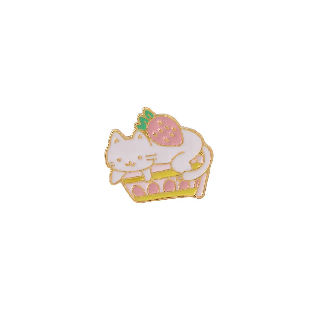 Alloy metal brooch showing a cute cat figure with a strawberry cake and dripping oil decoration.