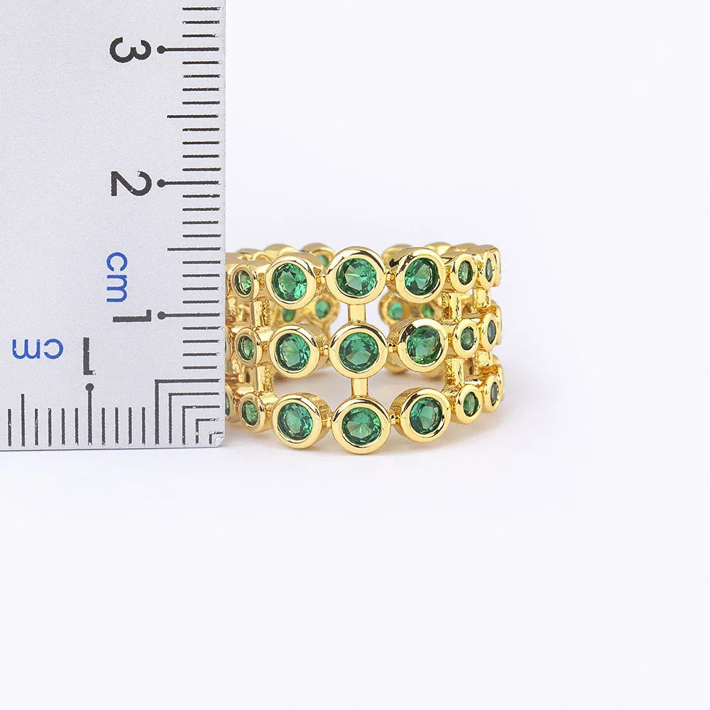 Copper 18K gold plated three-layer ring with green zircon stones in wide band unisex design