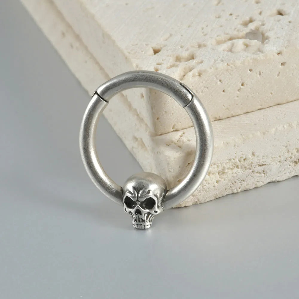 Copper ghost head punk earrings with antique silver finish