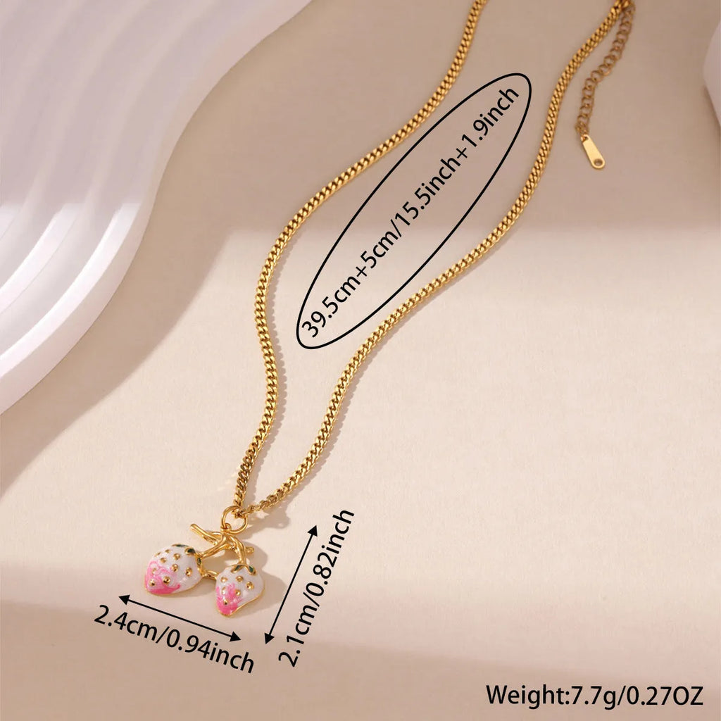 Stainless steel strawberry fruit pendant necklace for women showing red and white gradient colour options