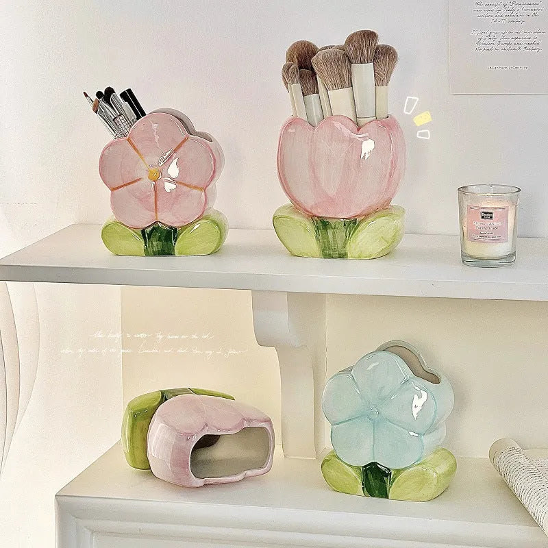 Ceramic floral pen holder storage box with pink tulip design on desktop
