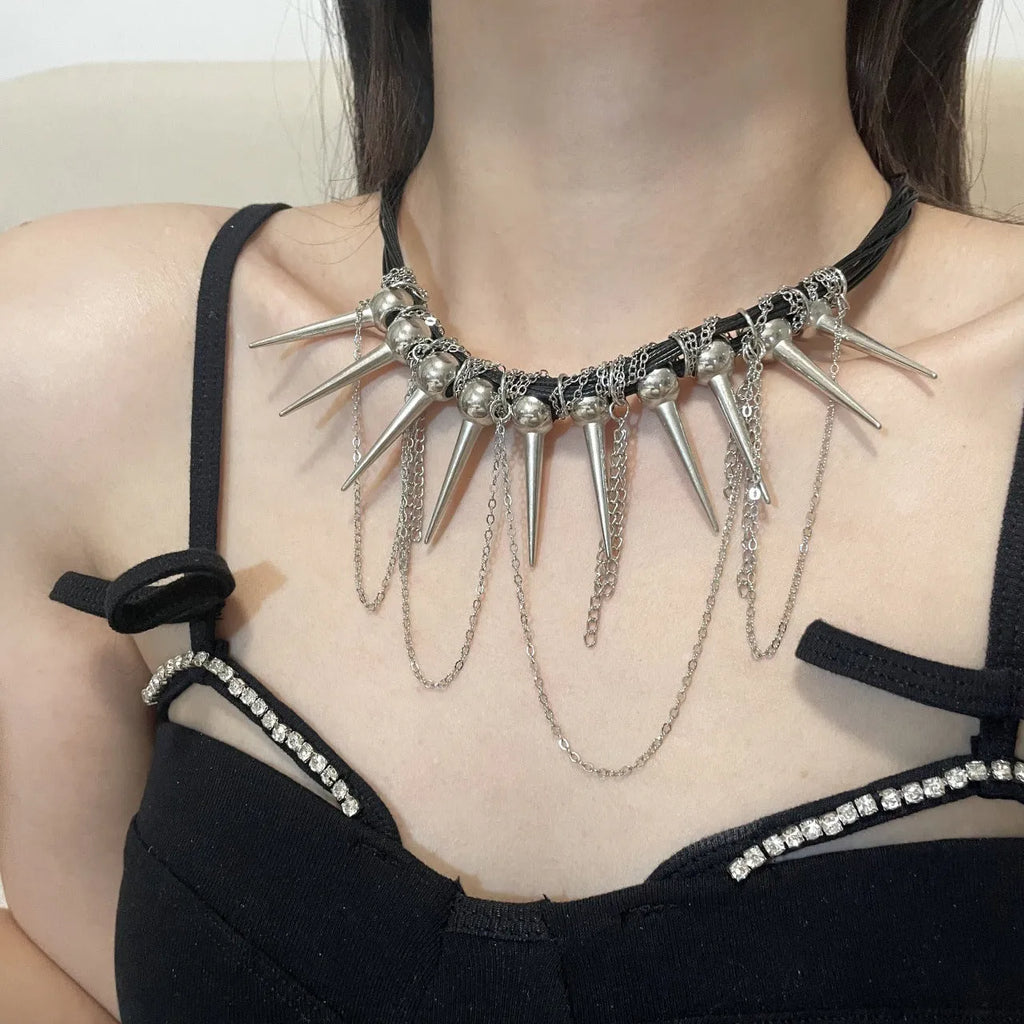 Women's leather winding tassel necklace with round beads and silver rivet details
