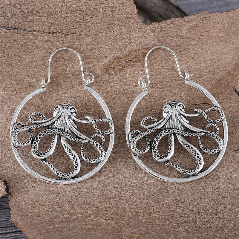 Antique silver octopus earrings with retro styling on zinc alloy construction