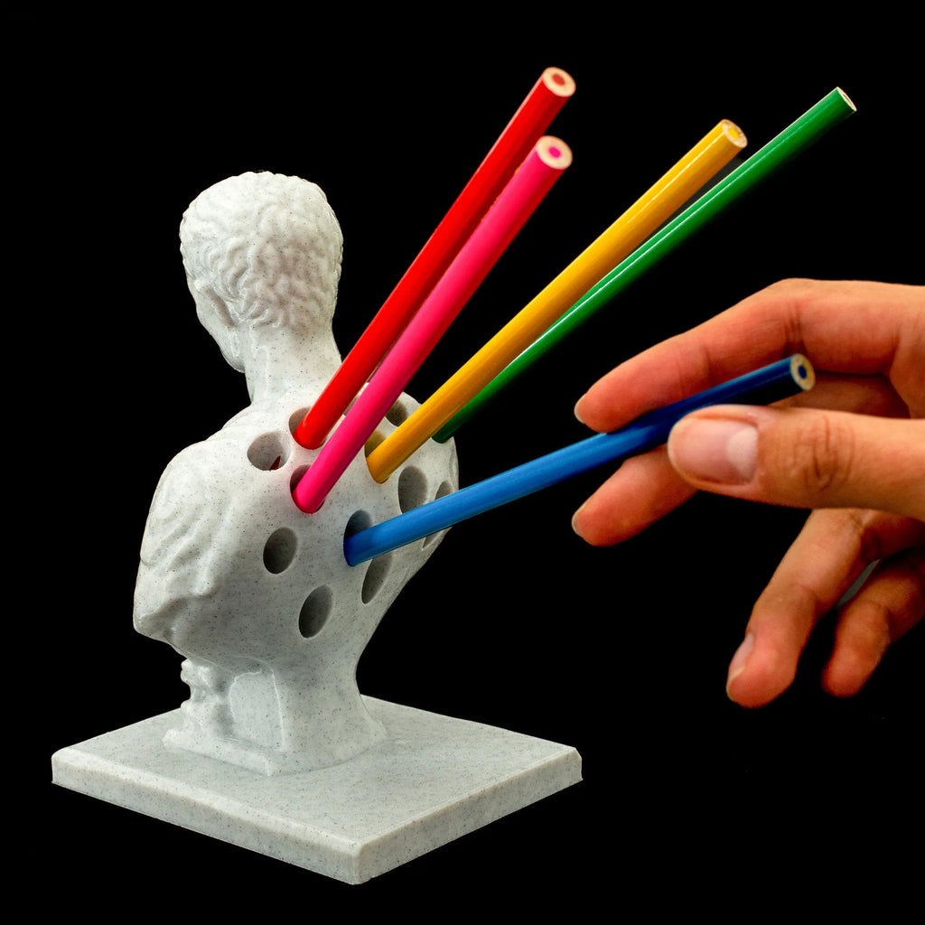 White synthetic resin statue-style pen holder with 15-pen capacity for desk storage