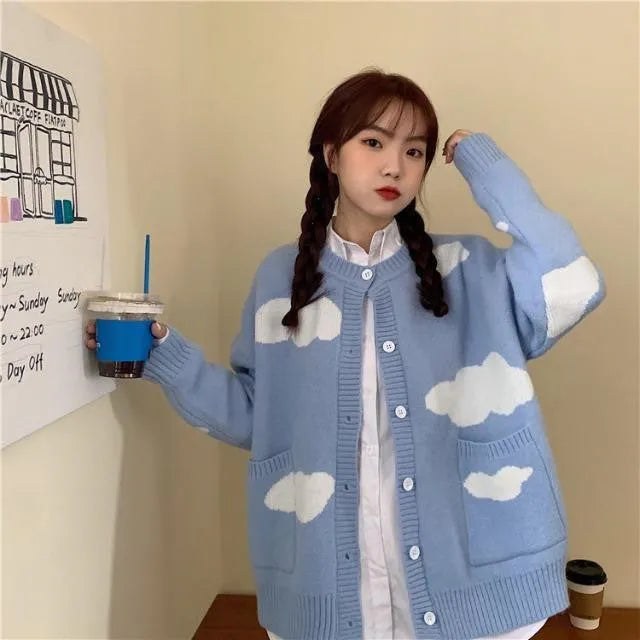 Women's blue cloud pattern cardigan sweater with loose fit and long sleeves