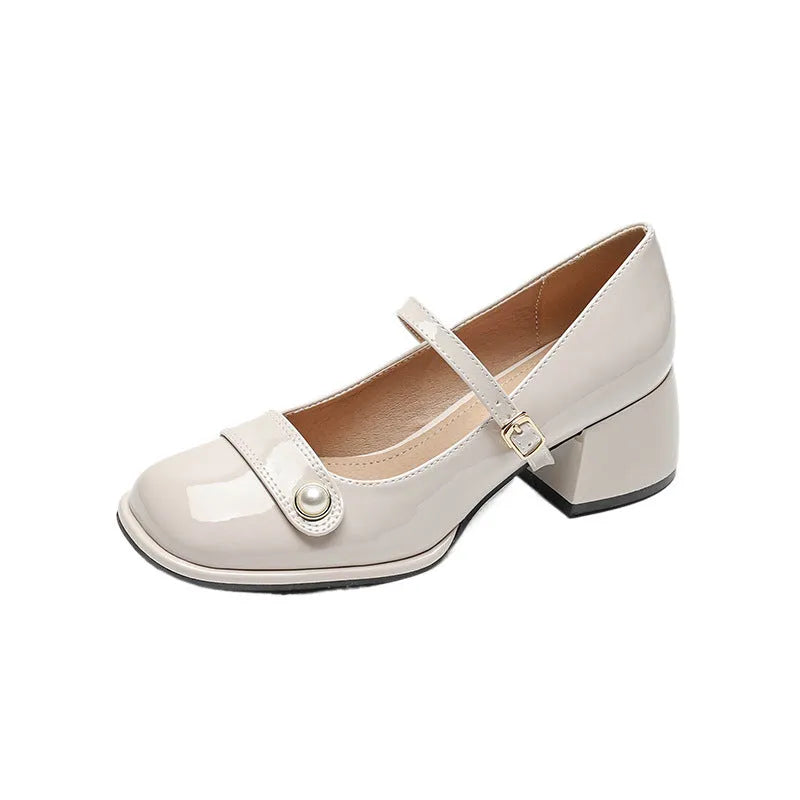 Women's patent leather ankle boots with chunky heels and square toe in apricot colour with buckle fastening