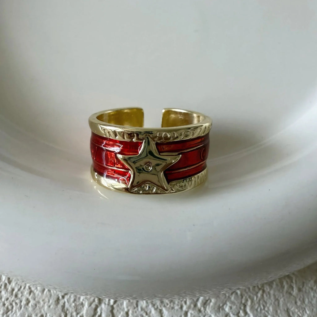 Adjustable retro-style geometric copper ring with line detailing and electroplated finish.