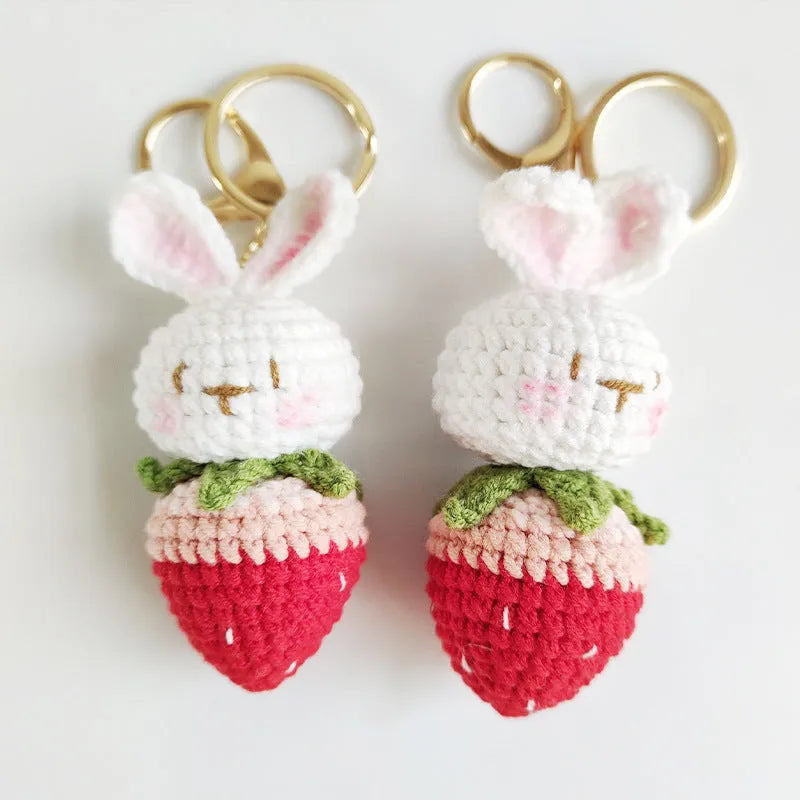 White hand-woven wire pendant with rabbit strawberry pattern and keychain attachment