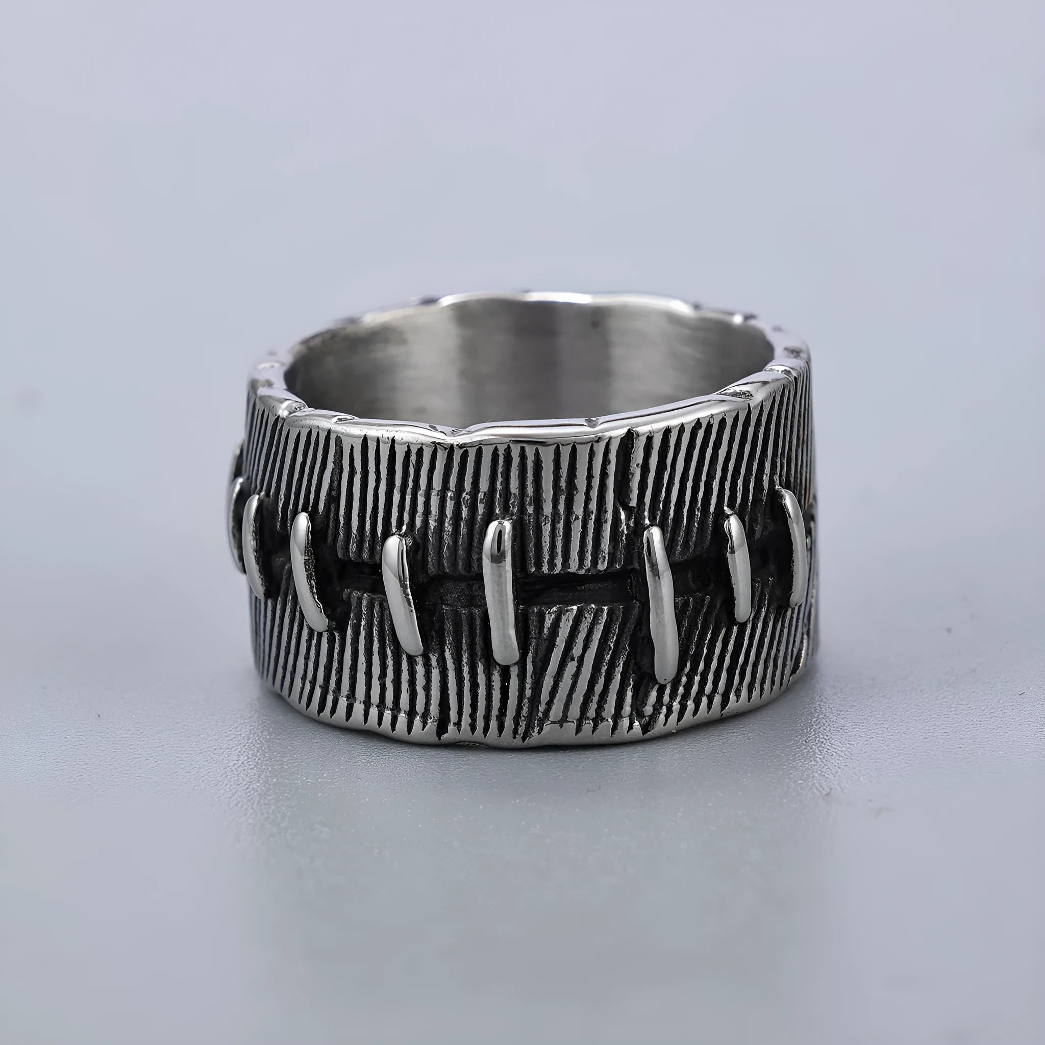 Dark punk stitched titanium steel ring with double U-shaped geometric design in retro colour