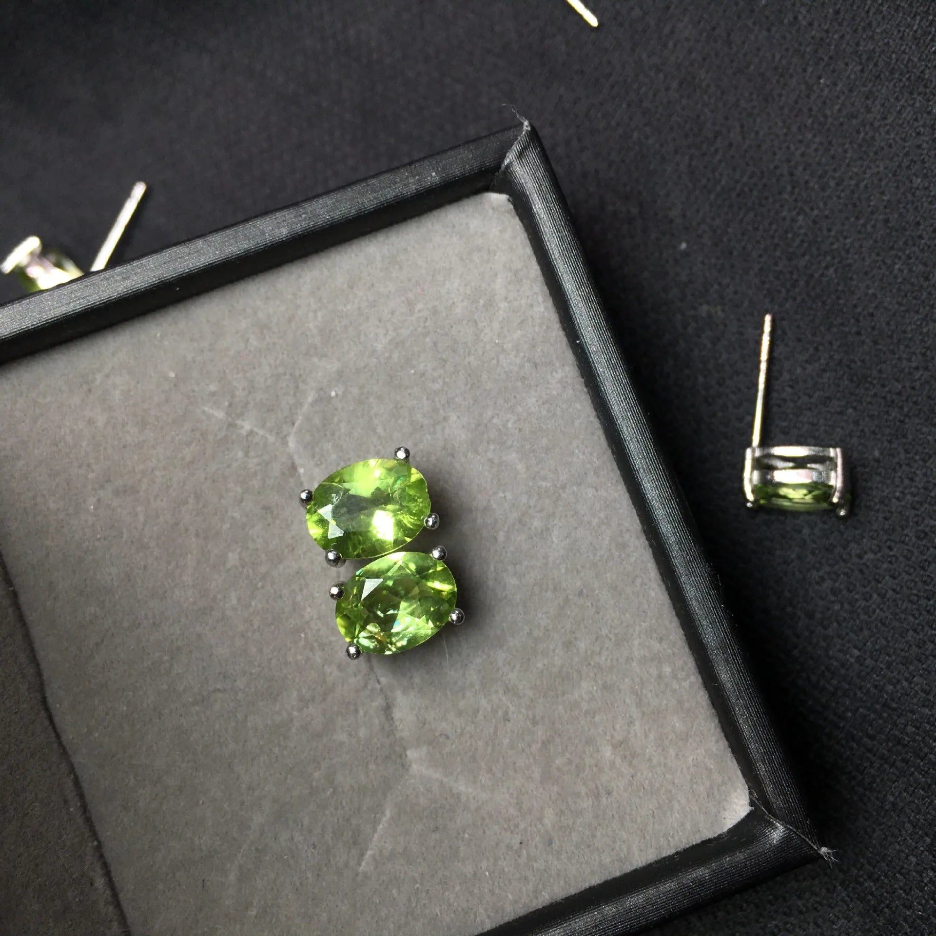 Grass green natural olivine oval stone stud earrings in S925 sterling silver.