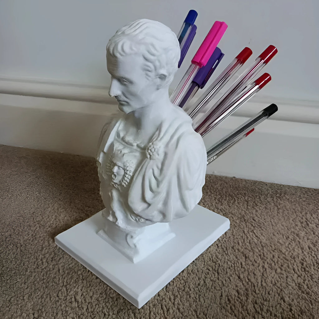 White synthetic resin statue-style pen holder with 15-pen capacity for desk storage