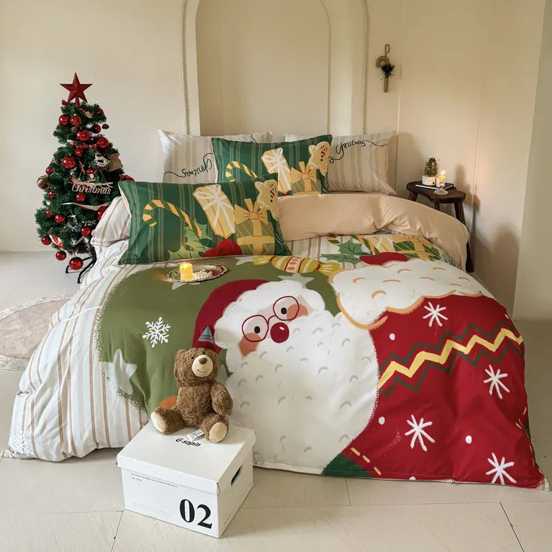 Christmas cartoon themed four-piece bedding set with duvet cover, fitted sheet and pillowcases on a bed.