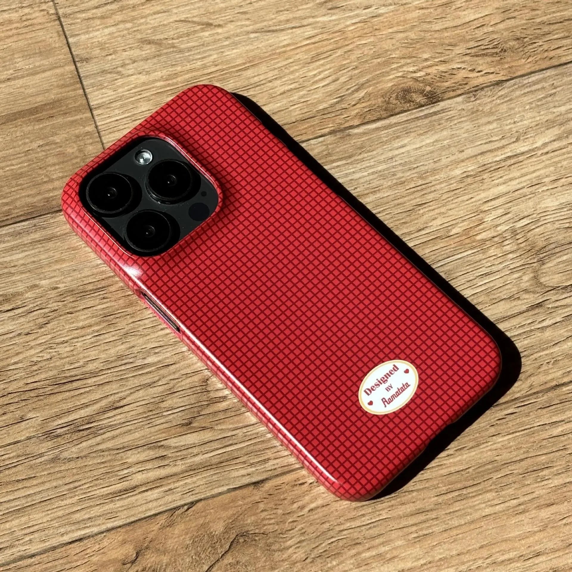 Original plain plaid anti-fingerprint phone case for iPhone 15 Pro Max in red and orange designs.