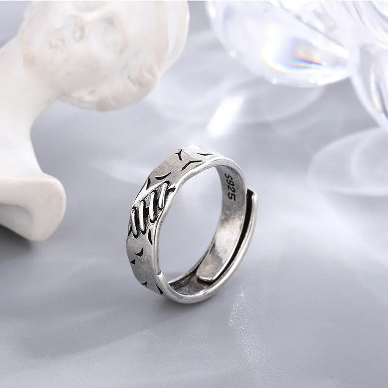 Black geometric copper ring with adjustable opening mechanism for women's fashion jewellery