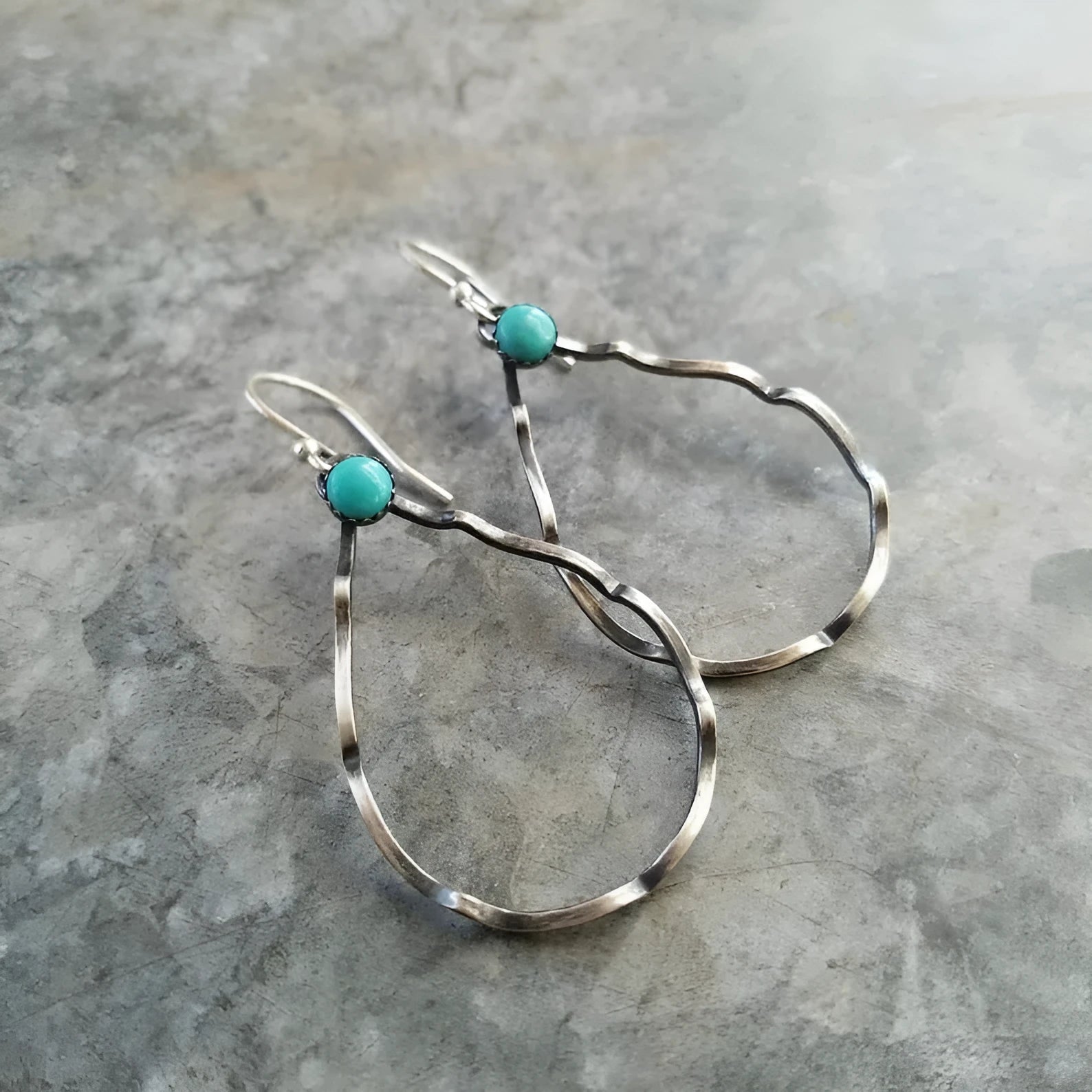 Antique silver bohemian earrings with turquoise circle geometric design